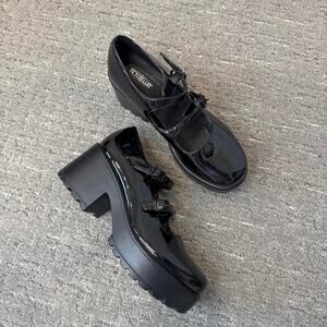 y2k style black shiny platform Mary Jane’s with the cutest buckle detail